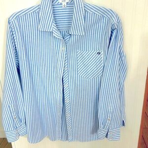 Long sleeve button up blue and white striped shirt.